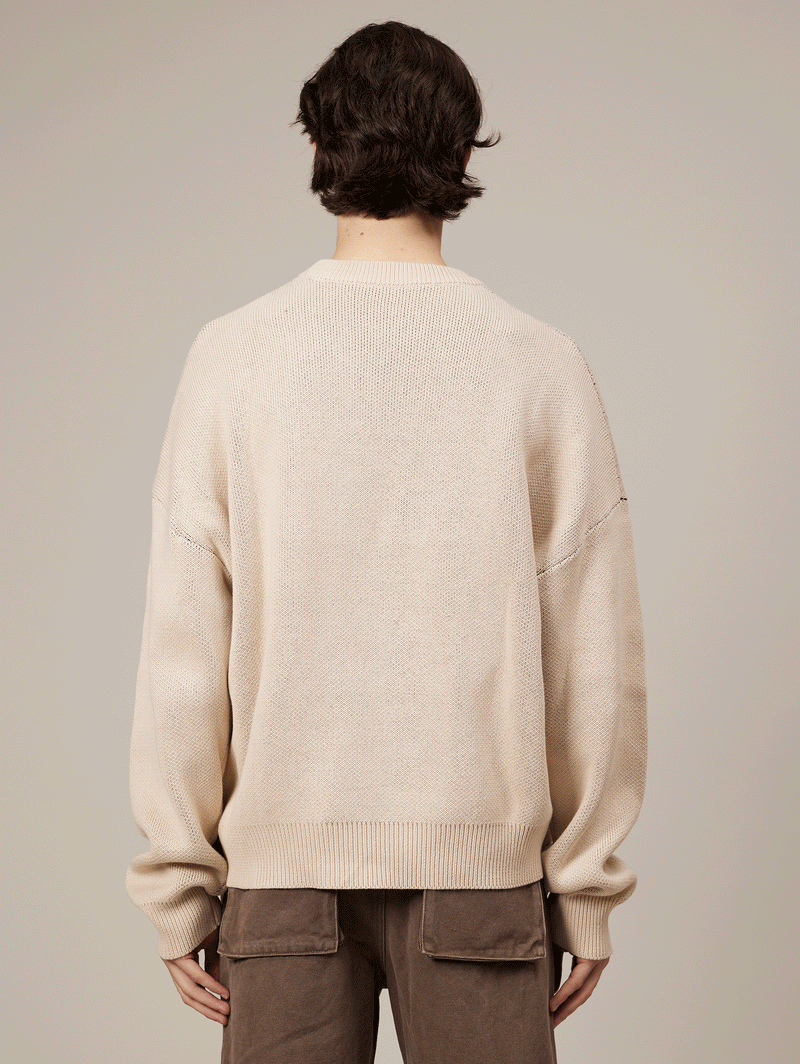 CREAM KNIT SWEATER "PRODUCTIONS"