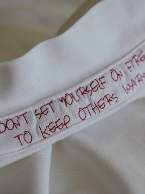 WHITE POLO SHIRT "MOSQUETS"