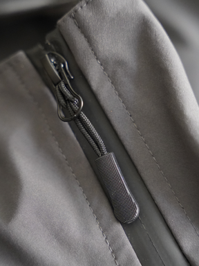 GREY RAIN SHELL JACKET "MOSQUETS"
