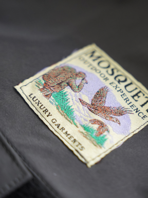 GREY RAIN SHELL JACKET "MOSQUETS"